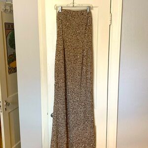 Floor-length black tie sequined dress